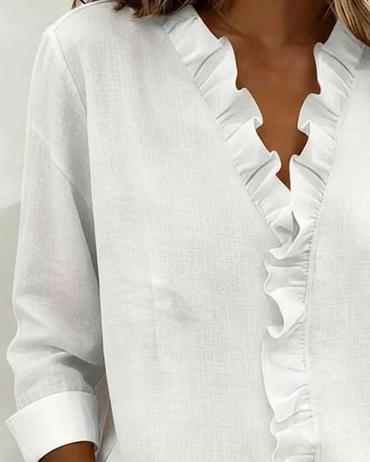 Varel | Blusa con volant, scollo a V e maniche lunghe