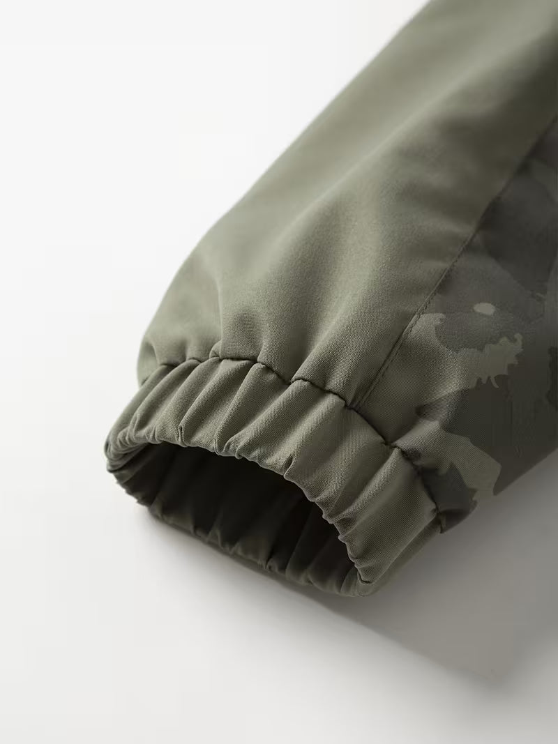 Varel | Giacca a vento con cappuccio in stile mimetico